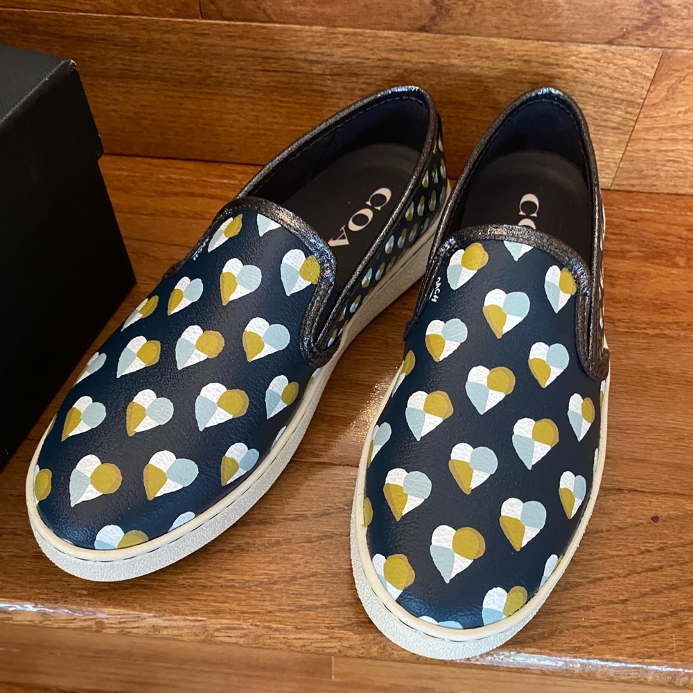 Coach heart slip ons